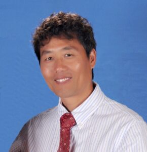 Professional headshot photo of Zhouping (Charlie) Guo