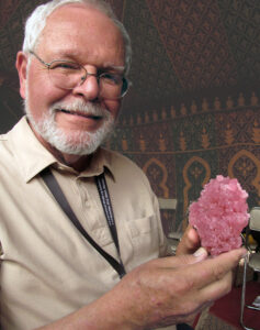 Terry Huizing holding a Moroccan pink calcite in 2012