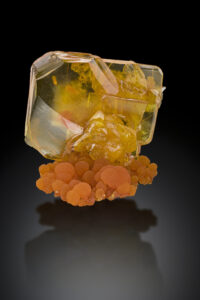 Wulfenite on Mimetite from San Francisco mine, Cucurpe, Sonora, Mexico. 3cm tall. Paula Presmyk collection. Jeff Scovil photo