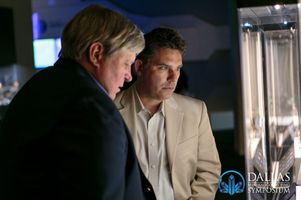 Jim Houran gazes into cases at the Perot Museum